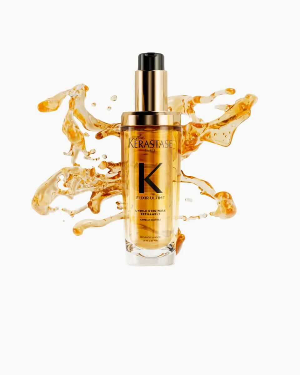 Kérastase Elixir Ultime hair oil with a splash of golden oil